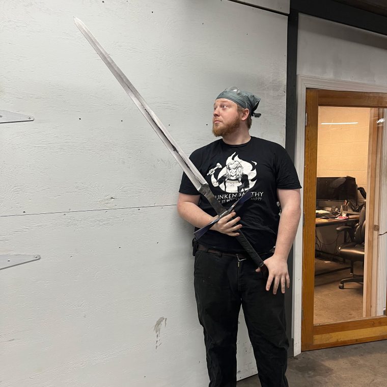 blacksmith holding great sword