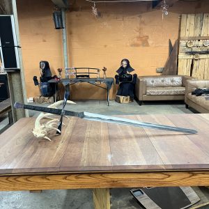 great sword on table